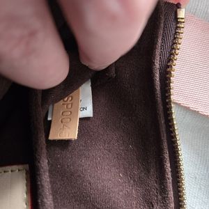 Louis Vuitton Pochette and makeup bag